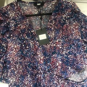 Brand new DKNY blouse, beautiful design in brigantine colors and print.
